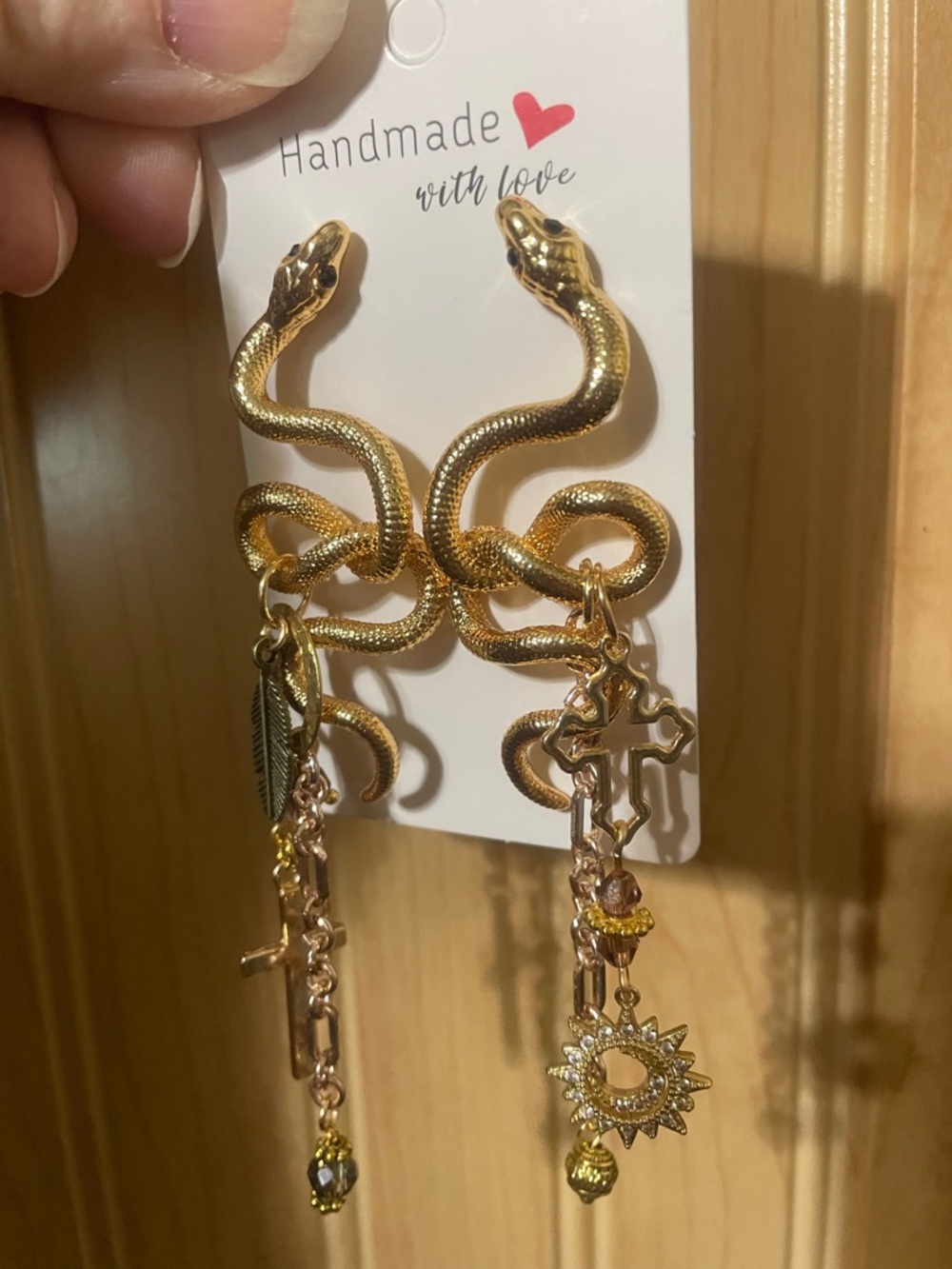 Hand Crafted Gold Snake Dangle Earrings with Cross & Sun Charms - Picture 3 of 7